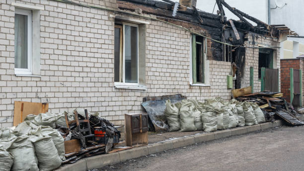 Professional Fire Damage Restoration technician working in Bloomsbury, NJ